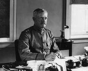 pershing at desk.jpg pershing at desk.jpg